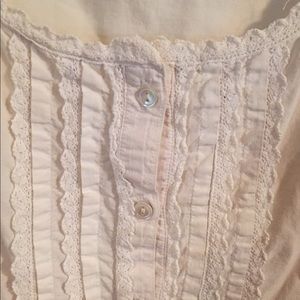 White button up tank with ruffles